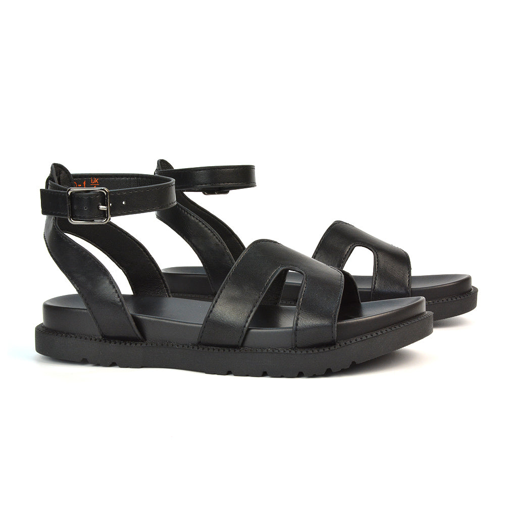 Eboni Ankle Strap Flatform Cut Out Flat Festival Sandals in Black Synthetic Leather