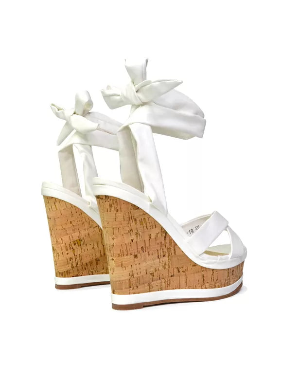 white sandal wedge heels