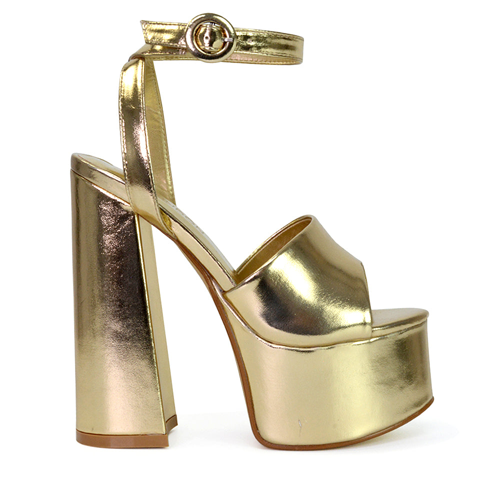 Pennie Strappy Super High Platform Shoes With a Chunky Heel in Gold
