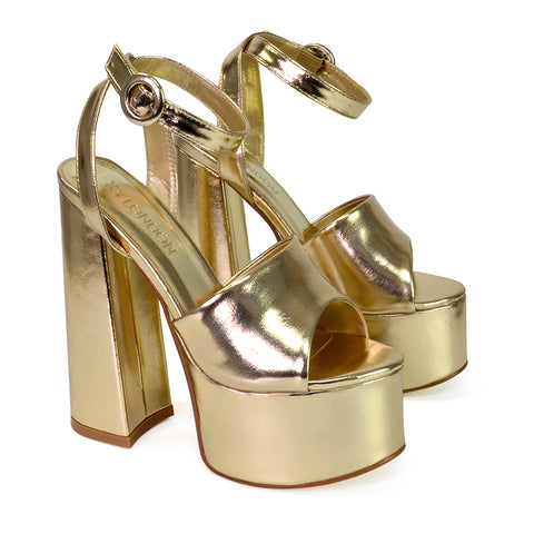 Pennie Strappy Super High Platform Shoes With a Chunky Heel in Gold