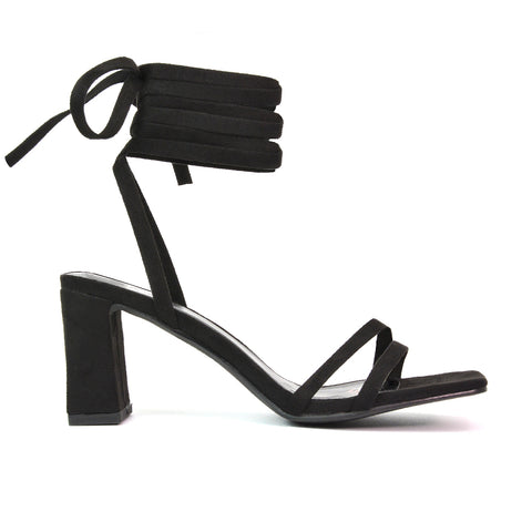 Tanyel Strappy Lace up Faux Suede Mid Block Heel Sandals in Black