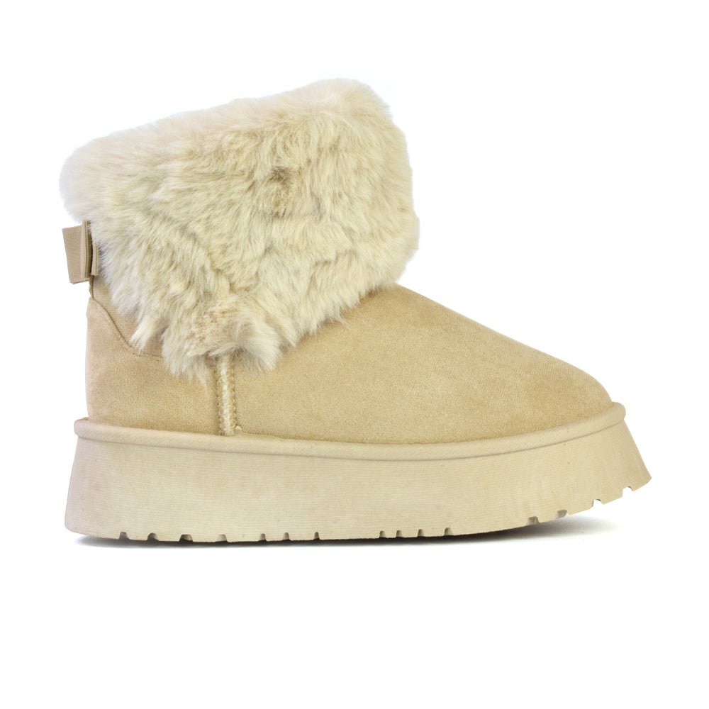 Winnie Platform Faux Fur Ankle Boots with Bow Detailing in Beige